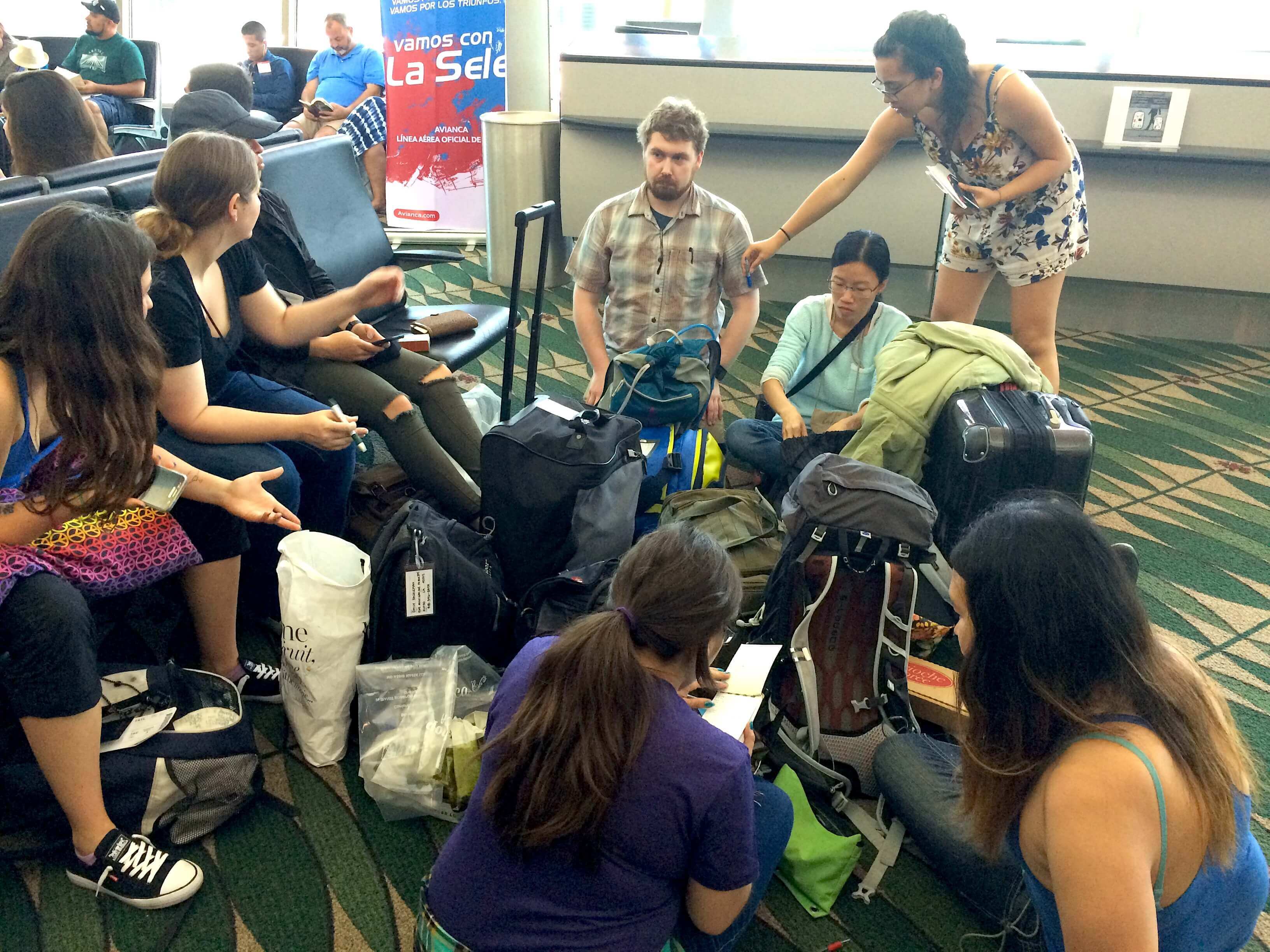 Students in the SFO airport preparing for a flight to Costa Rica.