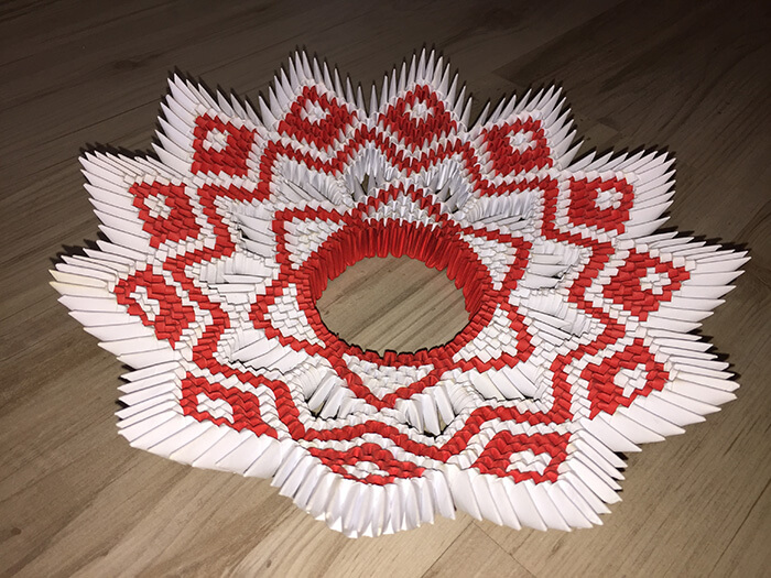 red and white weaving of a star pattern