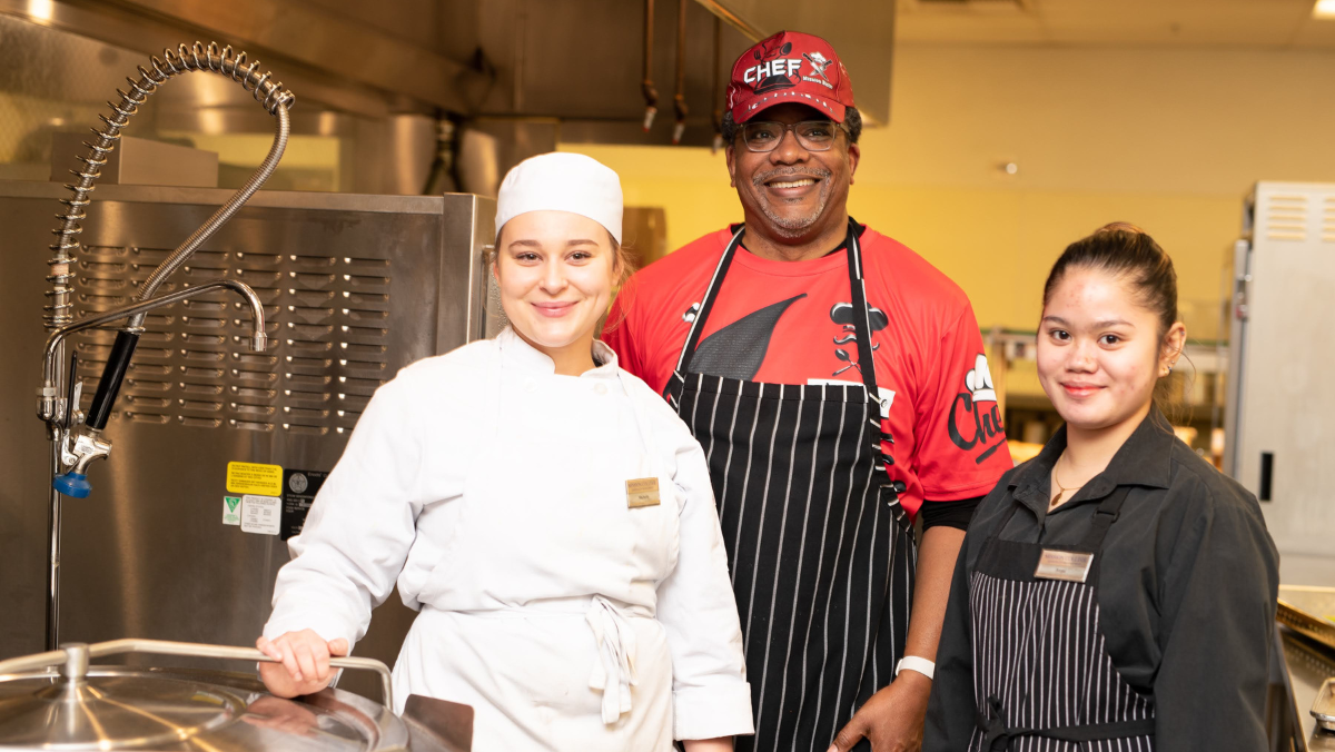 Hospitality Management students in classroom with professor