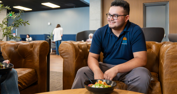 Student in lounge smiling