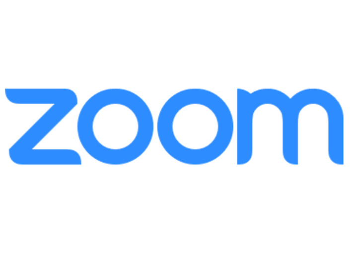 Zoom is written on a laptop screen.