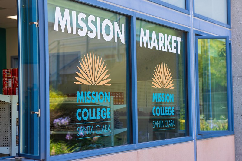 Mission Market sign on outside of Gilmor Center.