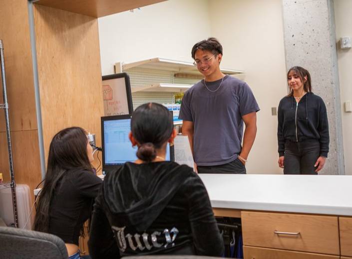 Students receive service at the Mission Market.