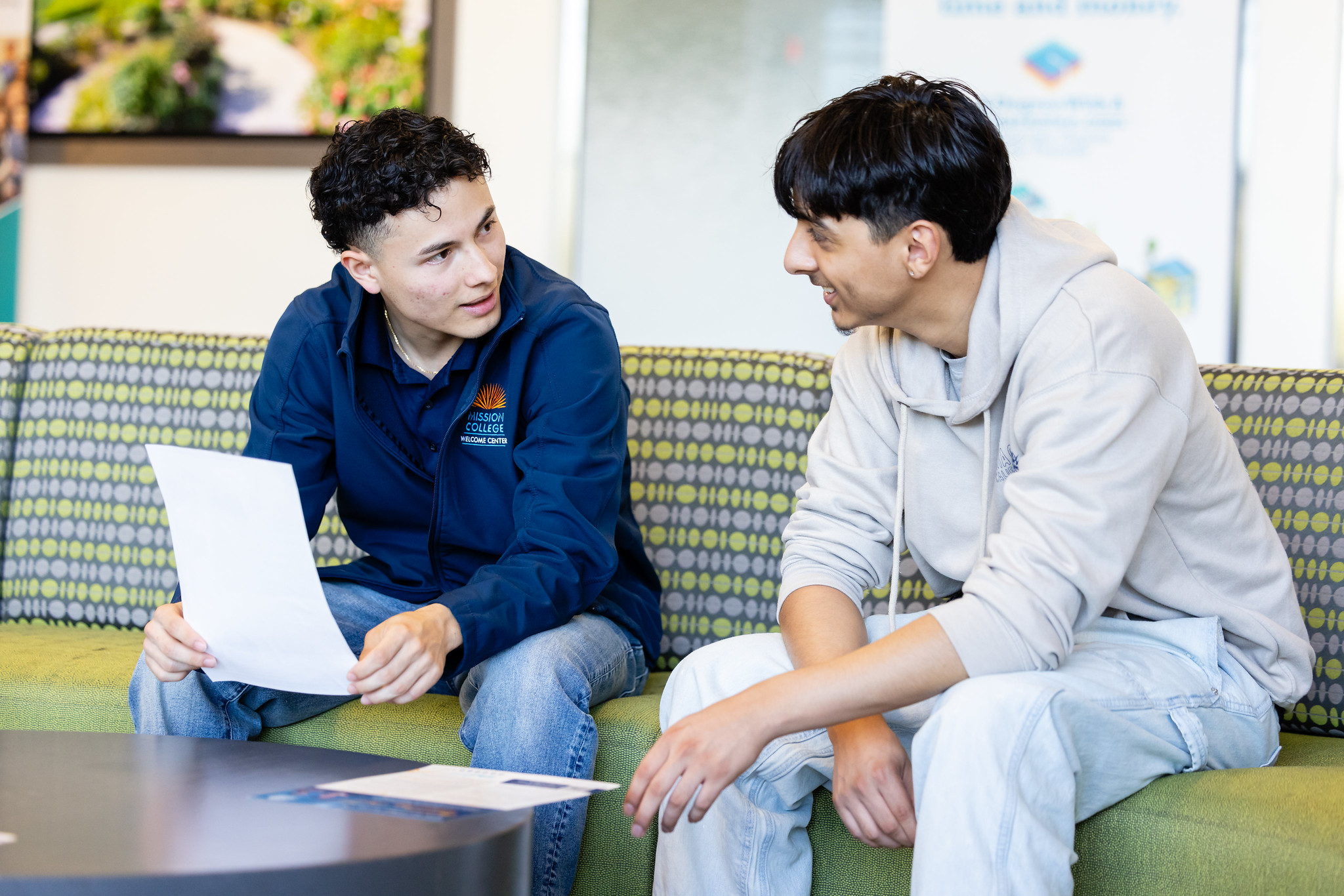 Ambassador helping student 