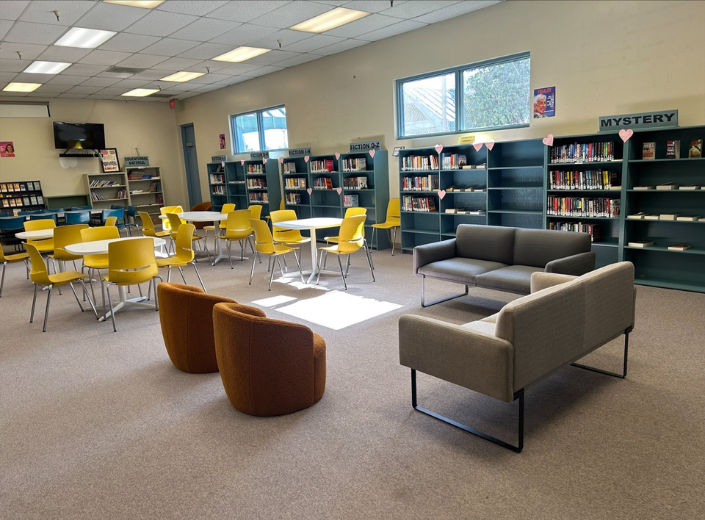 The updated men’s library at the Elmwood Correctional Complex features new furniture, expanded book collections, and flexible seating to support educational programming.