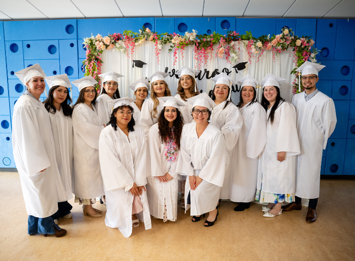 Smiling students at graduation