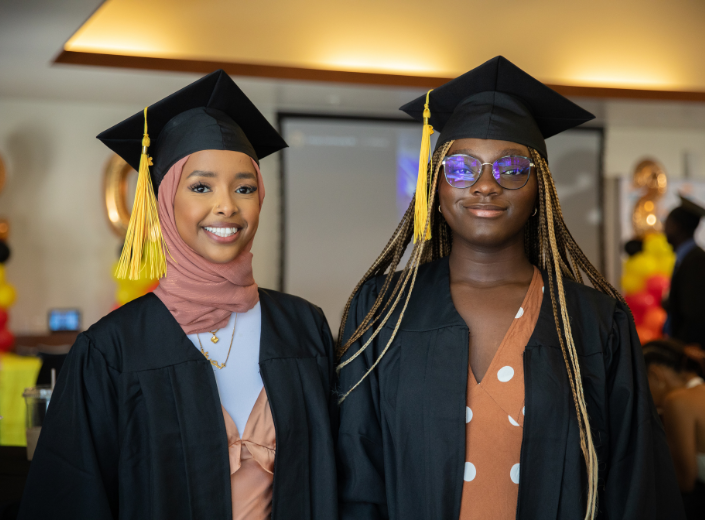 Smiling students at graduation