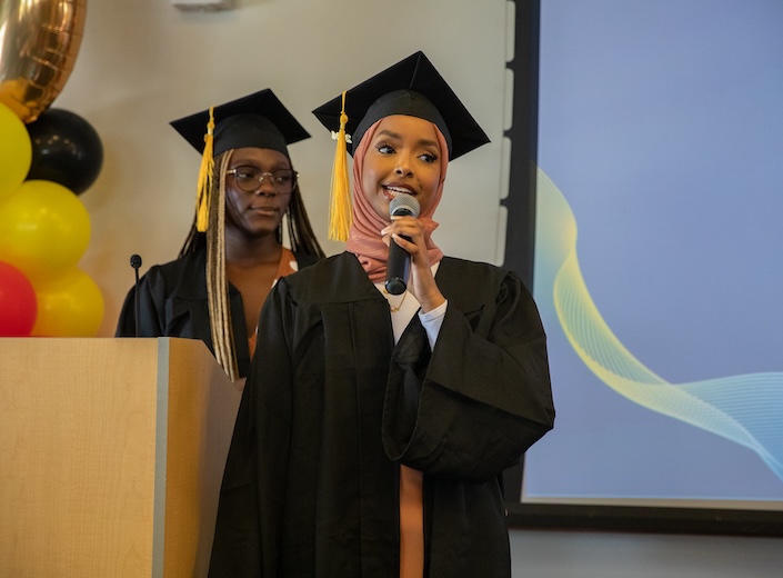 Nasra Mohamed speaks at Umoja Commencement